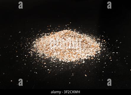 Broken Egg Shell Isolated, Crushed Eggshell, Calcium Supplement, Cracked Eggshells, Natural Compost Ingredient, Broken Egg Shells Pile on Black Backgr Stock Photo