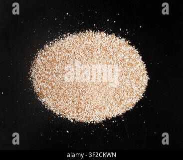 Broken Egg Shell Isolated, Crushed Eggshell, Calcium Supplement, Cracked Eggshells, Natural Compost Ingredient, Broken Egg Shells Pile on Black Backgr Stock Photo