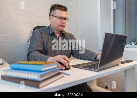 Coding, office and man on computer for programming, system upgrade and software design. Network, IT programmer and worker with pc for web development, Stock Photo