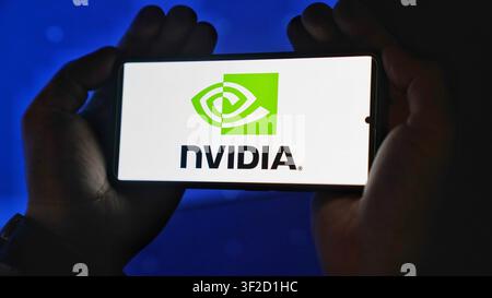 Nvidia tech company logo on a device screen Stock Photo