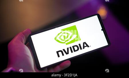 Nvidia tech company logo on a device screen Stock Photo