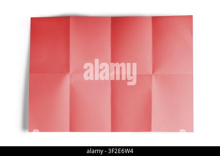 Light red colored, empty, blank paper sheet with visible folds and soft shadows isolated on white background, minimal mockup template, mockup for desi Stock Photo