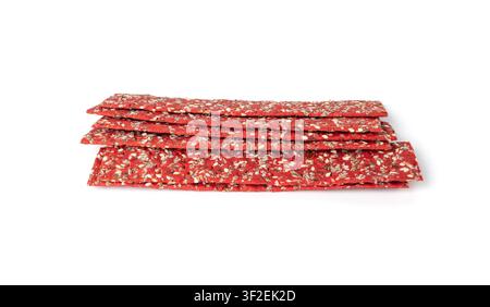 Beetroot crackers isolated, thin rusk beet root bread, red diet multigrain crispbread, various seeds whole grain crisp bread, long cracker on white ba Stock Photo