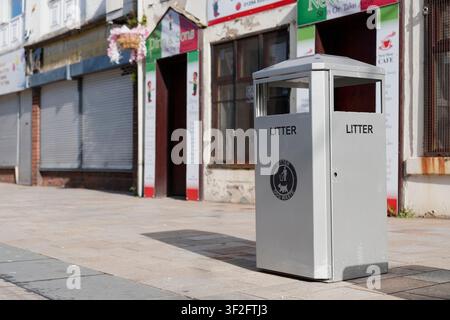 Litter bin on high street in city Stock Photo