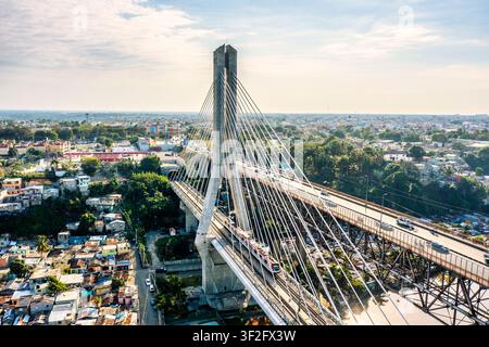 Aerial view of the Juan Bosch Bridge spanning the Ozama River with ...