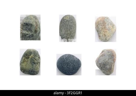 Set of natural sea pebbles isolated on white background. Stock Photo