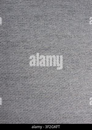 Gray black knitted textile texture background with dense loop pattern Stock Photo