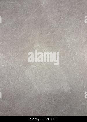 Neutral gray concrete surface texture with subtle worn marks and industrial character Stock Photo