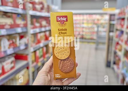 Gluten-free, gluten-free chocolate chip cookies Sable Choc by Schaer Digestive Cookie in golden packaging, pack of cookies, product, supermarket, Kau Stock Photo