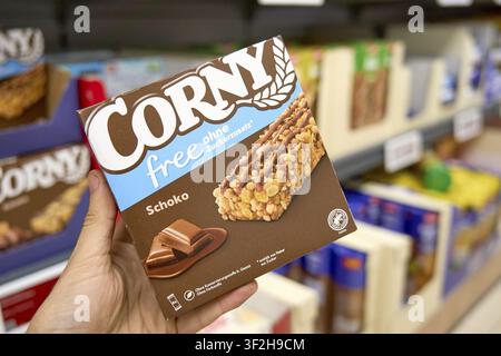 No added sugar, brown packaging from Corny free with chocolate on supermarket shelves, Lidl food retailer discounter, supermarket product, in Saxony-A Stock Photo