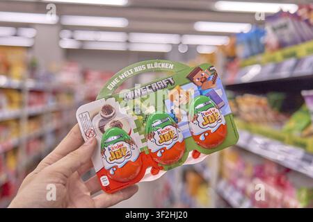 Kids chocolate surprise eggs, pack of Kinder Joy with Minecraft theme is kept in supermarket, food product, candy, grocery store, supermarket, Kauflan Stock Photo