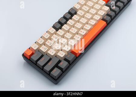 Mechanical gaming keyboard close up on light gray background Stock Photo