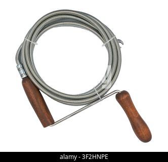 Plumbing snake for pipe cleaning on a white background Stock Photo