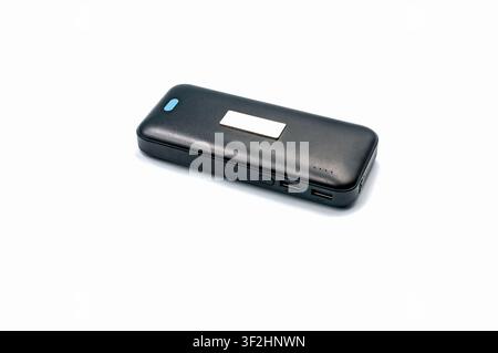 Black portable power bank charger isolated on white background Stock Photo