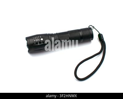 Modern black tactical LED flashlight isolated on white background Stock Photo