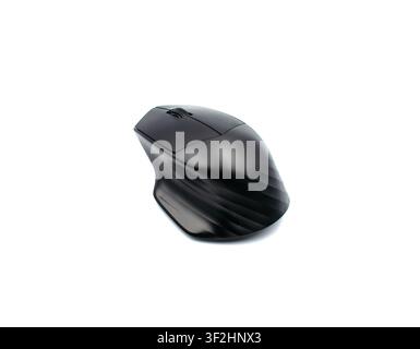 Modern black ergonomic wireless computer mouse on a white background Stock Photo