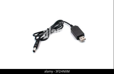 Black USB to DC power charging cable isolated on white background Stock Photo