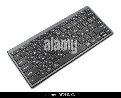 Modern compact wireless computer keyboard isolated on white background Stock Photo