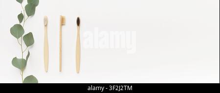 Bamboo toothbrushes for family isolated on white Stock Photo