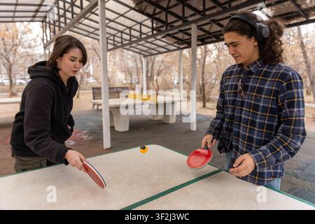 Two Students Playing Table Tennis Together Stock Photo