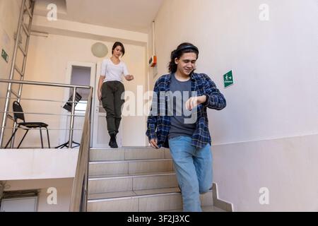 Students walking down the stairs Stock Photo