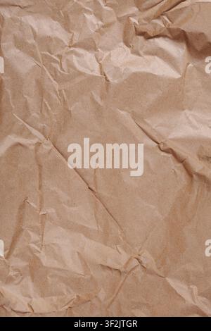 Crumpled Kraft Packaging Paper Texture Background Vertical Stock Photo