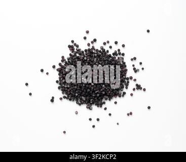 Candy black sprinkle pile, round sugar sprinkles isolated, sweet color confectionery decoration, many small sugar balls on white background top view Stock Photo