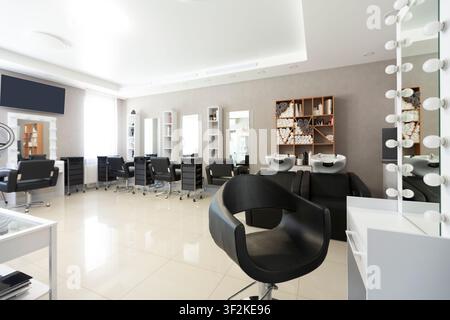 Barber chair for client on front background at interior Stock Photo
