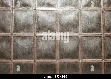 background is wall of square metal blocks Stock Photo