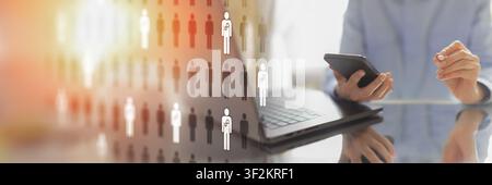 Robotic process automation system for business workflow efficiency with laptop and smartphone interaction Stock Photo