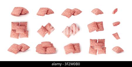 Fruit pillows, strawberry corn pads for breakfast isolated. Pink crispy corn flakes with milk and berry filling on white background Stock Photo