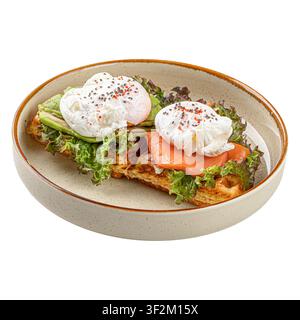 Waffles with salmon and poached eggs isolated Stock Photo