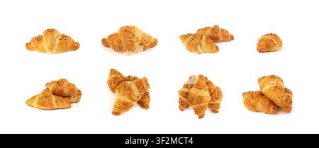 Delicious croissant with nut crumbs isolated. Fresh butter croissant pastry, sweet French bakery on white background Stock Photo