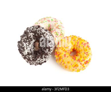Doughnuts Pile Isolated, Chocolate Brown, Yellow and Pink Donuts, Donuts Stack with Multicolored Sprinkles, Doughnuts on White Background Stock Photo