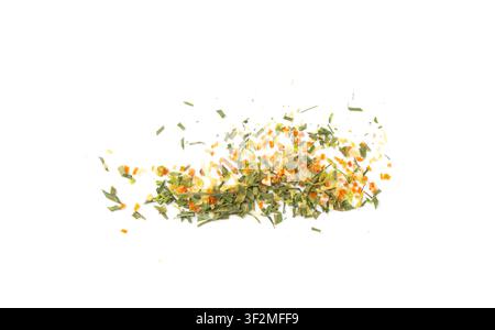Dried vegetable mix isolated. Dehydrated greens, onion, carrot pieces, seasoning chips, flakes blend on white background Stock Photo