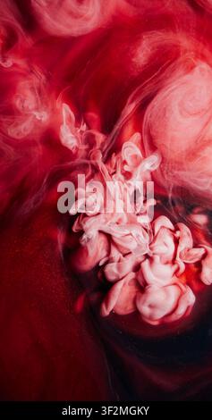 Turbulence paint. Pigment splash. Sparkling cloud color spray particles flow liquid. Red white fume abstract twirl mix blur background. Stock Photo
