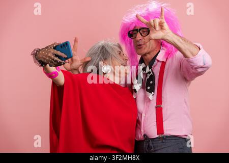 Senior couple having fun taking selfie with phone Stock Photo