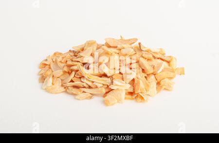 Dry Garlic Slices Isolated, Crispy Fried Cloves Pile Closeup, Roasted Grilled Garlic Flakes, Clove Chip Group on White Background Stock Photo