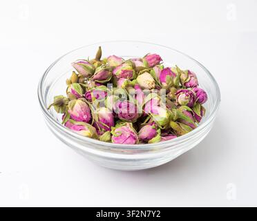 Dry Rose Buds, Roses Petals for Pink Flower Tea, Dried Persian Rosebuds, Rose Buds Textured Flowers Isolated on White Background Stock Photo