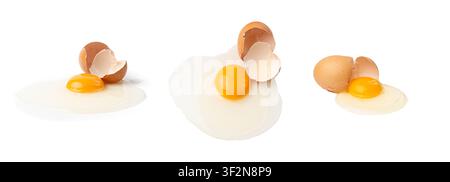 Broken Egg Isolated, Raw Yolk and White, Cracked Brown Shell, Fresh Broken Organic Chicken Eggs on White Background Stock Photo