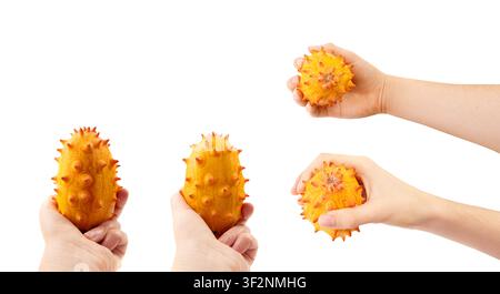 Kiwano isolated, jelly melon, cucumis metuliferus ripe fruit, orange horned melon, african horned cucumber, spiked melon on white background closeup Stock Photo