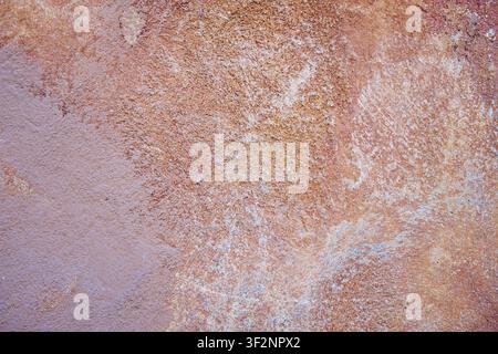 Rustic Terracotta Stucco Wall Texture Background with Weathered Plaster and Earth Tone Surface. Stock Photo