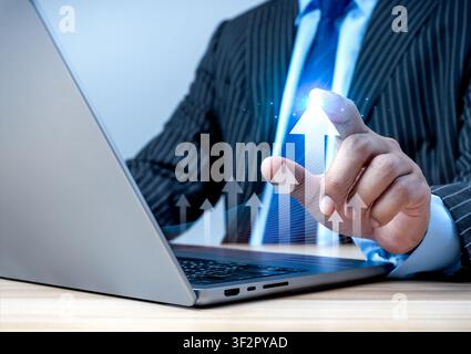 Business growth concept with executive analyzing digital performance dashboard, revenue growth, sales improvement, business strategy, financial succes Stock Photo