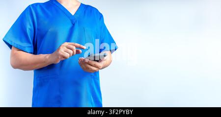 Doctor using smartphone for AI healthcare, telemedicine, electronic medical records, mobile health, hospital systems, digital health, medical applicat Stock Photo