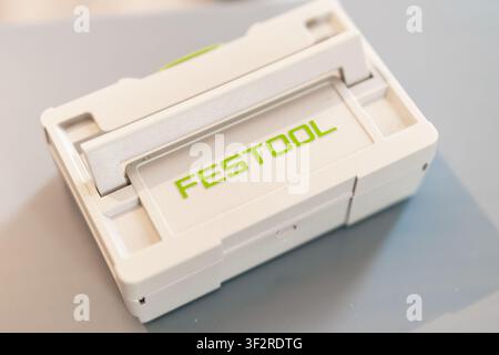 PRAGUE, CZECH REPUBLIC - JUNE, 2026. Festool case designed for storing and organizing equipment used in woodworking. The sturdy white storage unit features a prominent green logo and is ideal for maintaining an organized workspace.  Stock Photo