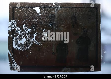 Old Photo in Broken Frame with Cracked Glass Effect Stock Photo