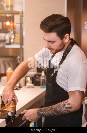 Barista Man Making Coffee Working In Own Cafe Stock Photo