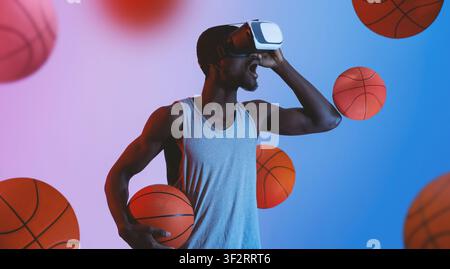 Young Black Male Wearing Vr Headset While Holding Basketball, Sport Concept Stock Photo