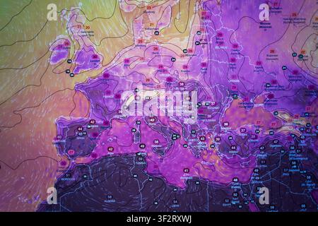 European weather map in vivid purple hues showing an extreme heatwave across Europe and North Africa. High temperature numbers are clearly labeled. gl Stock Photo