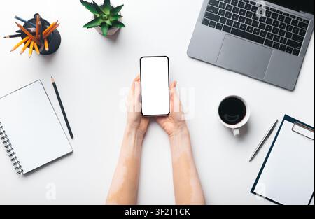 Woman working at home office and want to make order Stock Photo